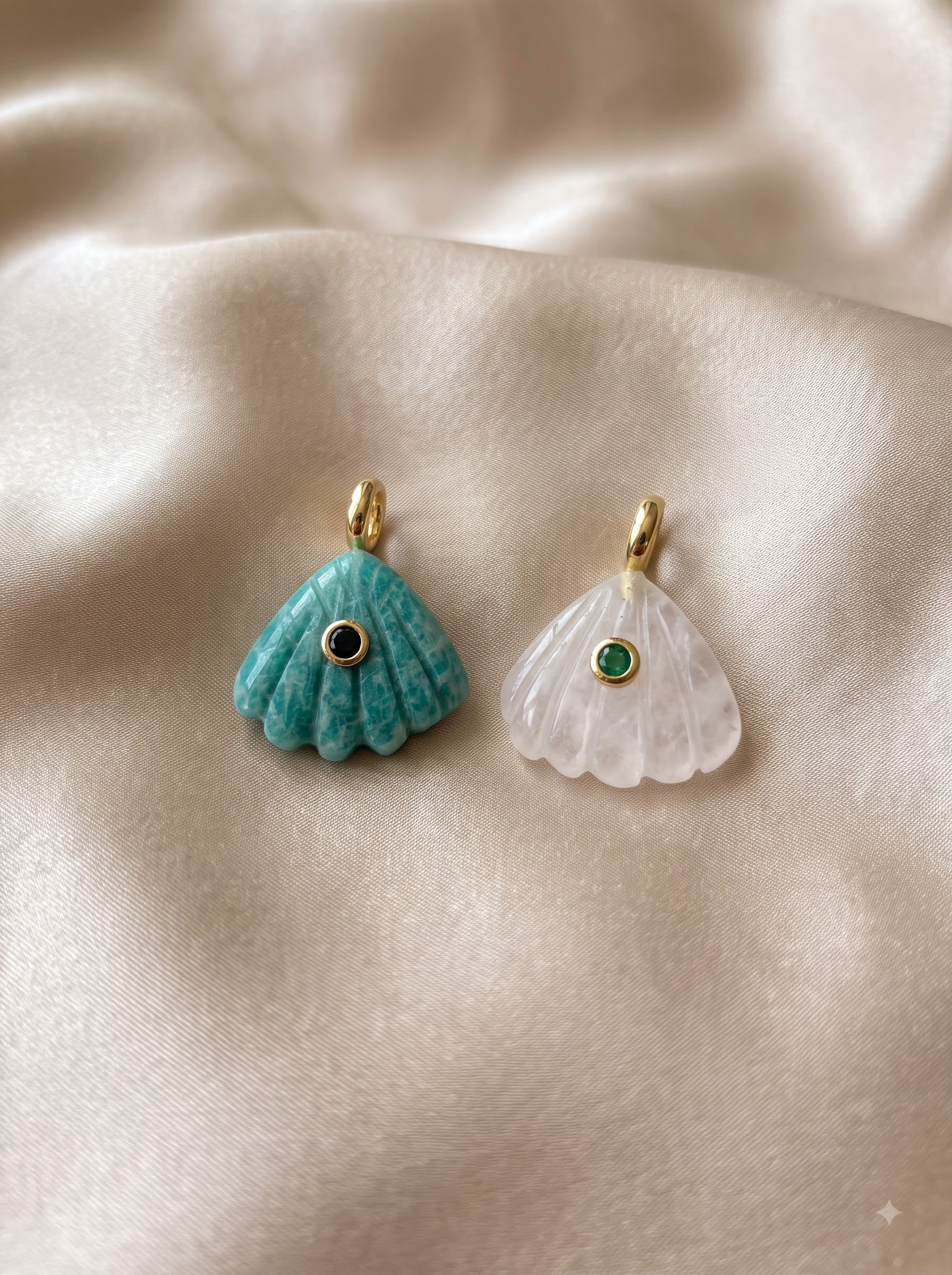 carving sea shells with center stones and 14K plating